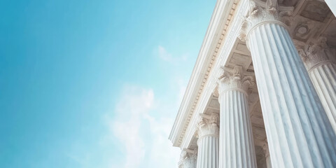 Grand courthouse against the sky. Marble column details on building