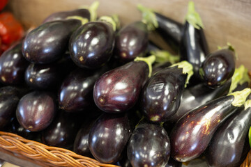 Fresh eggplants laid out nicely for sale in market