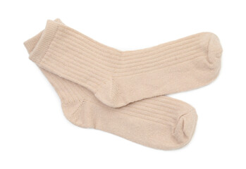 Pair of soft socks isolated on white, top view