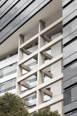Building with stained glass windows and a modern design, blending vibrant colors with sleek,...