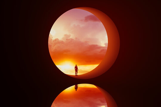 Silhouette of a man in a round window under a colorful sunset