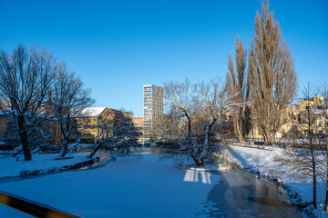 Motala Stream and the old industrial landscape during winter in Norrköping. Norrköping is a historic industrial town in Sweden.