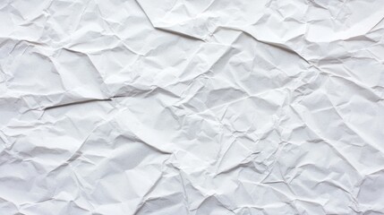 Obraz premium Crumpled white paper texture background for design purposes.