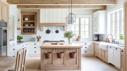Bright, airy farmhouse kitchen with wooden island, white cabinets, and natural light.