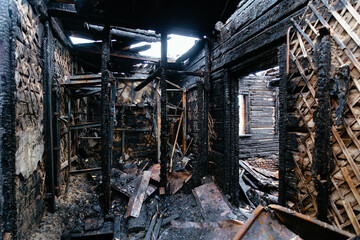 Aftermath of fire. Completely burnt house interior