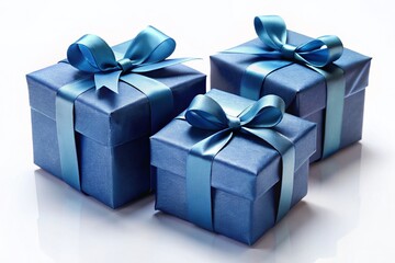 Obraz premium Three Elegant Blue Gift Boxes with Dark Blue Ribbons, Ready for Giving - Isolated White Background