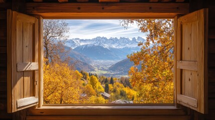 A large wooden window revealing the beauty of autumn leaves and snowy mountain peaks in the distance.