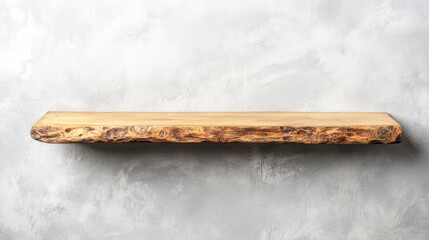 A vintage wooden shelf with subtle scratches, placed against a light gray wall in a quiet interior.