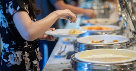 scooping the food, catering, dinner time