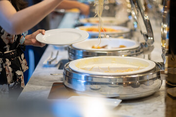 scooping the food, catering, dinner time