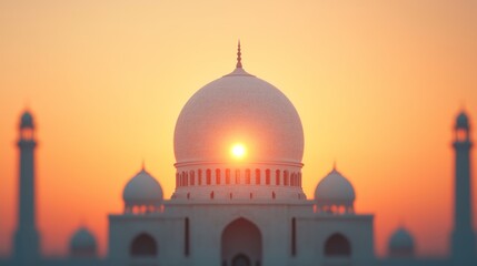 Majestic Mosque Silhouette Against Vibrant Sunset Sky with the Sun Setting Behind Dome