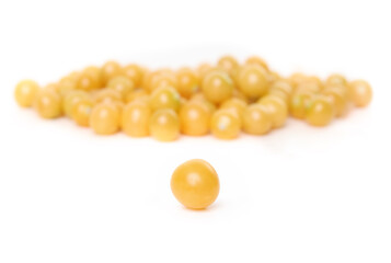 Ground cherry or golden cherry with defocused pile. Many small yellow orange cherries. Aunt Molly’s ground cherry harvest. Poha berry, pichuberry or inca berry. Selective focus.