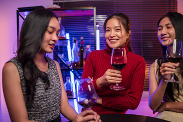 Party Celebrate whiskey at a friendly party in a restaurant. Night.