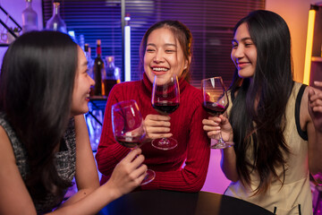 Party Celebrate whiskey at a friendly party in a restaurant. Night.