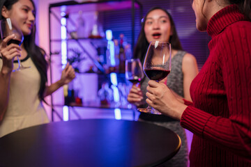 Party Celebrate whiskey at a friendly party in a restaurant. Night.