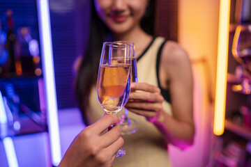 Party Celebrate whiskey at a friendly party in a restaurant. Night.