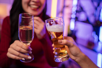 person holding a glass of champagne