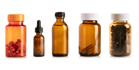 Medicine pills in glass bottle collection isolated on white background.