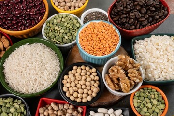 several pots with raw grains for preparing healthy food