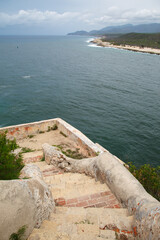 Bay and the walls of Castillo del Morro or San Pedro de la Roca fortress XVII century fortress,...