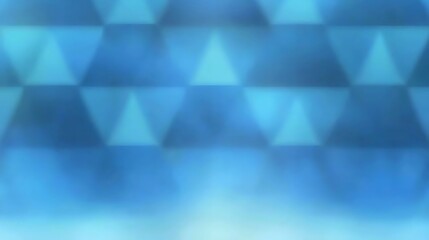 Abstract blurred background with blue triangles.