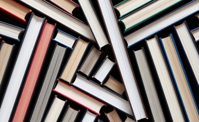 A colorful and abstract arrangement of book spines creating a geometric pattern.