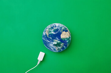 Green Energy Charging the Planet: Sustainable Future Concept