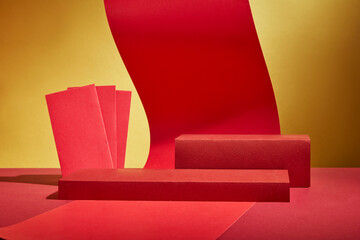 An image of a Lunar New Year picture with a golden backdrop. A frontal angle of red paper strings...