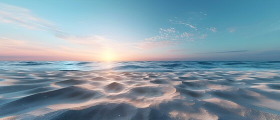 Obraz premium Tranquil ocean landscape at sunrise with gentle waves reflecting soft colors of the sky and soothing sand patterns