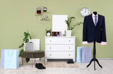 Interior of boutique with men's accessories, mannequin and commode