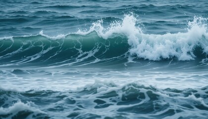 Fototapeta premium Ocean waves in motion, showing the energy of the sea with splashes and mist.
