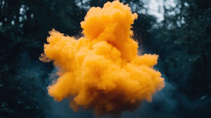 A vibrant orange smoke cloud billowing against a dark forest backdrop.