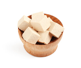 Bowl with cut tofu cheese isolated on white background
