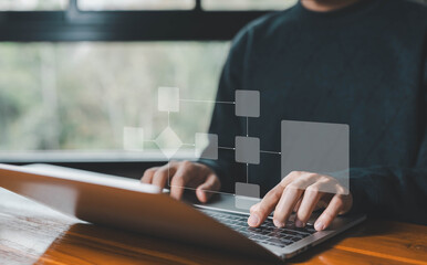 business processes and algorithm diagram flow on a computer laptop.  hierarchy scheme, data...