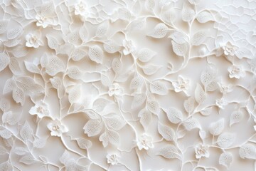 Intricate floral design on a textured white background showcases craftsmanship and artistry in decorative elements