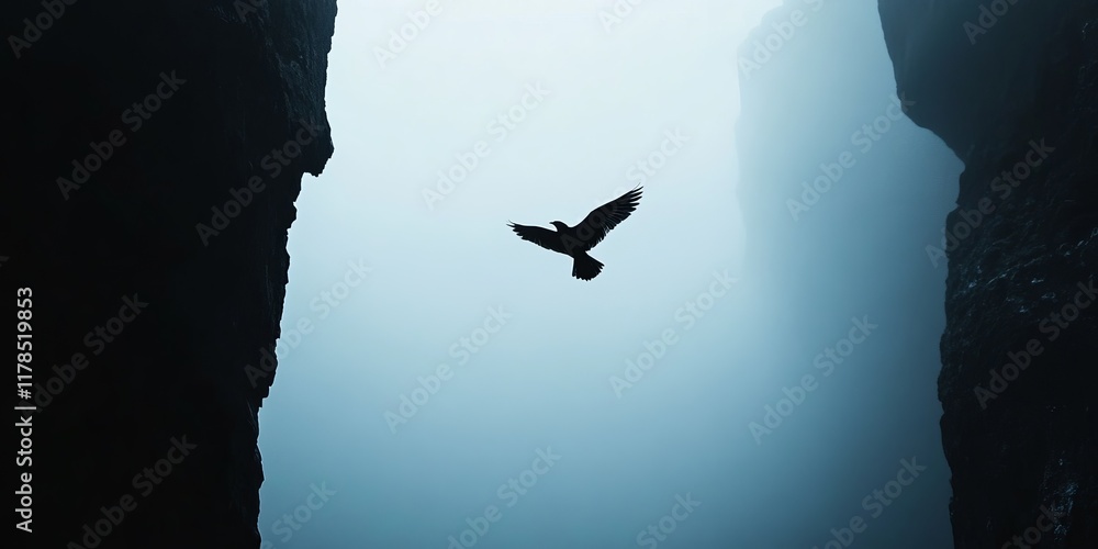 Poster a lone bird gracefully flies between towering cliffs enveloped in mist, creating a serene and myster