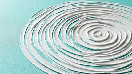 Fototapeta premium Abstract white concentric circles on teal background.