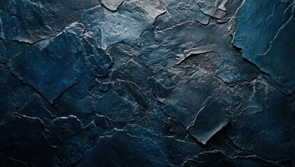 Dark blue slate stone wall texture background.
