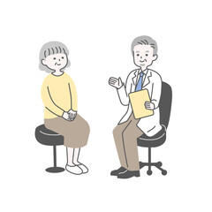 椅子に座るシニア女性と医者