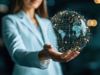 Businesswoman Holding Holographic Earth Model Representing Digital Connectivity and Global Networking in Modern Office Environment