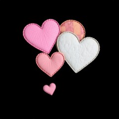 Fototapeta premium Heartfelt Cluster: A charming arrangement of textured hearts in varying shades of pink and white, set against a dramatic black backdrop. Perfect for Valentine's Day, love, and romance themes.
