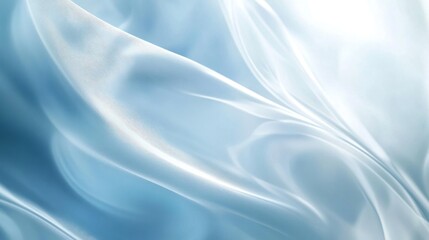Obraz premium Abstract light blue silk fabric with flowing waves and soft, shiny texture.