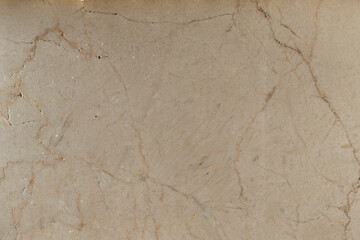 Textura de mármol con grietas en color beige