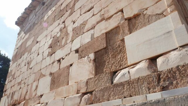 Inscriptions in the stones of the Athenian treasury, Delphi, Greece