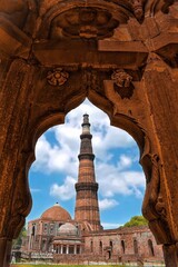 clicked this low angle frame in frame photograph of qutub minar .
