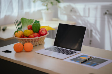 A dietitian or nutrition specialist in a doctor's office, wearing a lab coat, provides attentive counseling to patients, discussing weight control, diet, and digestive health.