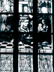 Biblical scenes on stained glass. Arch-see in Frombork.