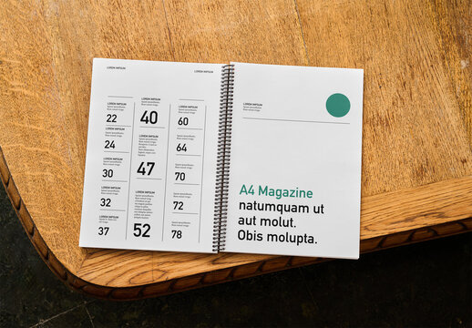 Mockup Of Customizable Vertical Open Spiral Bound Notebook