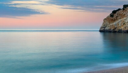 Obraz premium Serene Ocean Sunset with Soft Pastel Colors