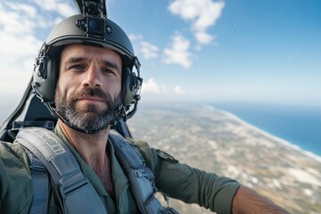 Naklejka premium Military pilot takes selfie during flight over coastal landscape in clear weather